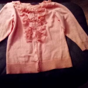 The limited size Med excellent condition ruffletop